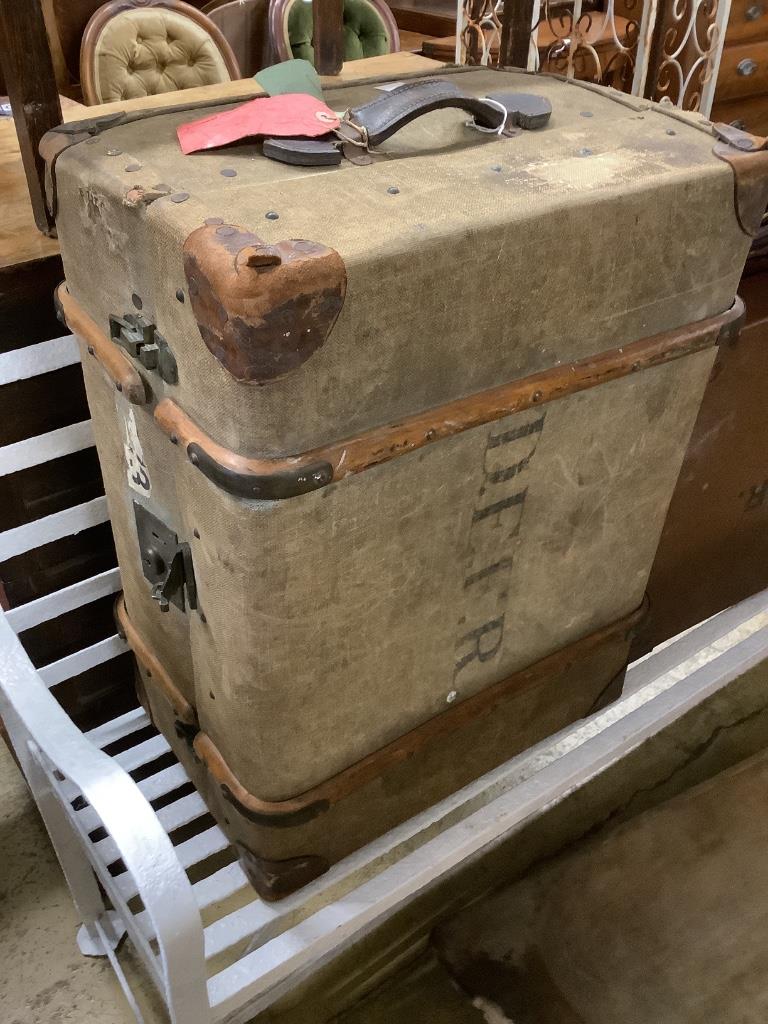 Three vintage suitcases and trunks